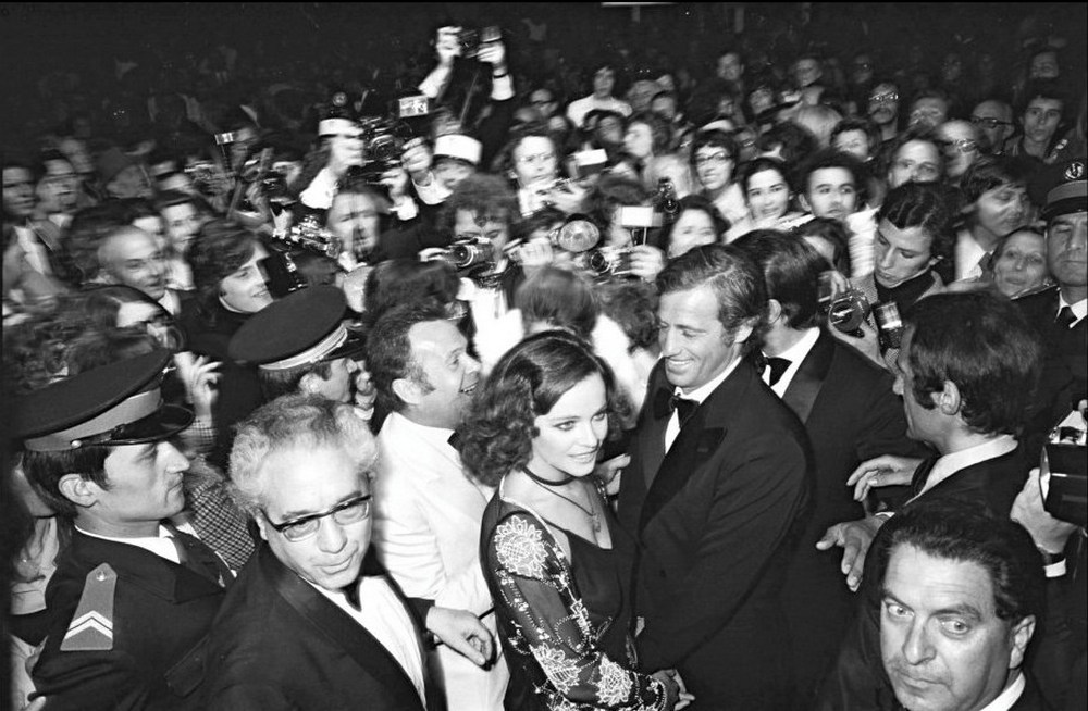 Jean-Paul-Belmondo-and-Laura-Antonelli-at-the-Cannes-Festival-for-the-movie-Stavisky-by-Alain-Resnais-1974.